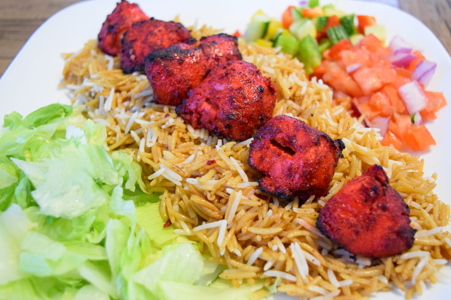 Tandoori chicken ricesalad and naan